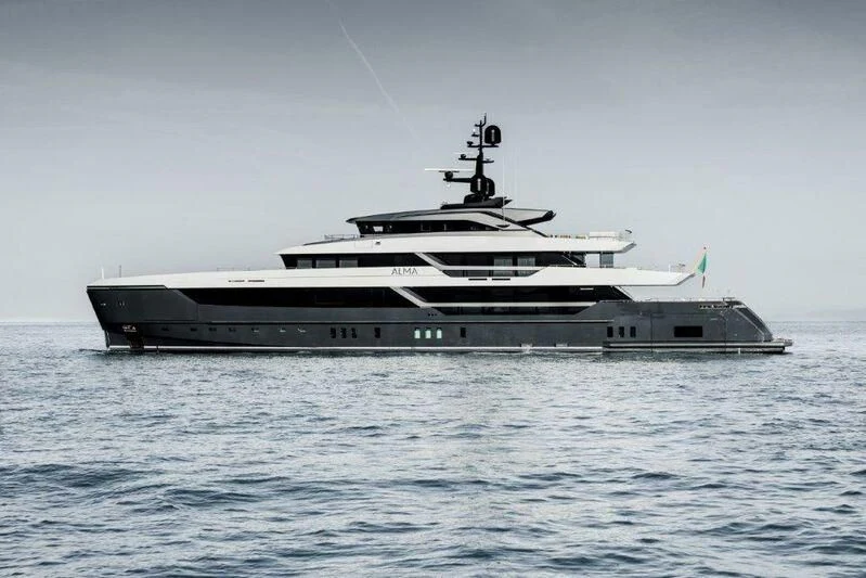 a large ship in the water aboard MY ALMA Yacht for Sale
