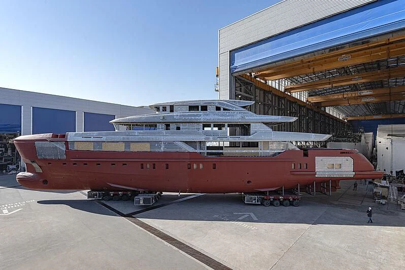 a large red and white boat aboard MY ALMA Yacht for Sale