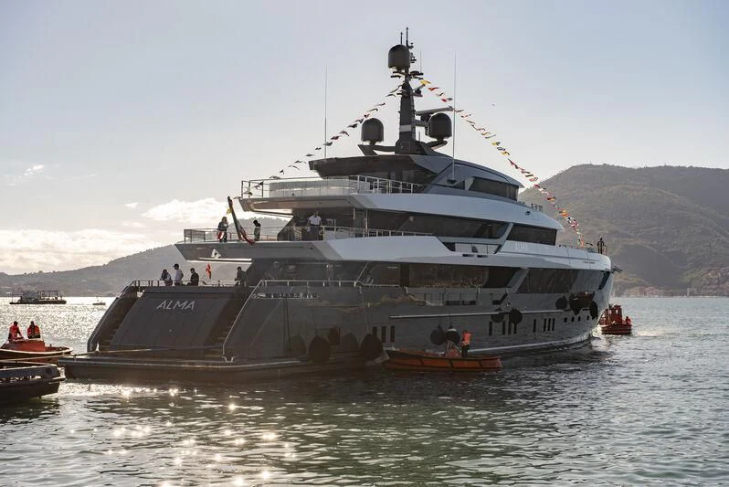 a large ship in the water aboard MY ALMA Yacht for Sale
