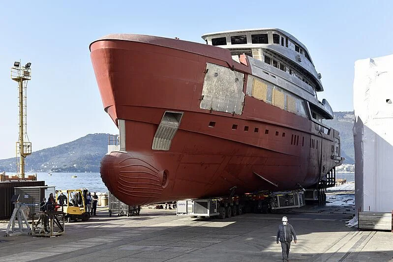 a large ship docked aboard MY ALMA Yacht for Sale