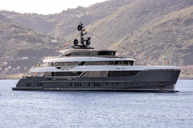 a large ship in the water aboard MY ALMA Yacht for Sale