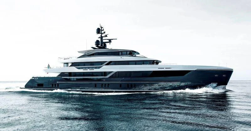 a large ship in the water aboard MY ALMA Yacht for Sale