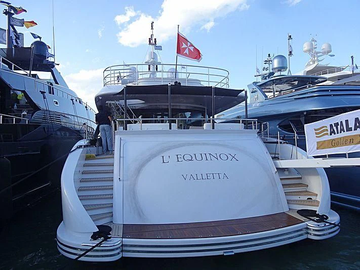 a couple of boats are parked in a dock aboard L'EQUINOX Yacht for Sale
