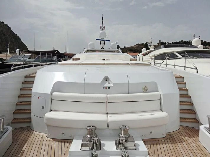 a large white boat on a deck aboard L'EQUINOX Yacht for Sale