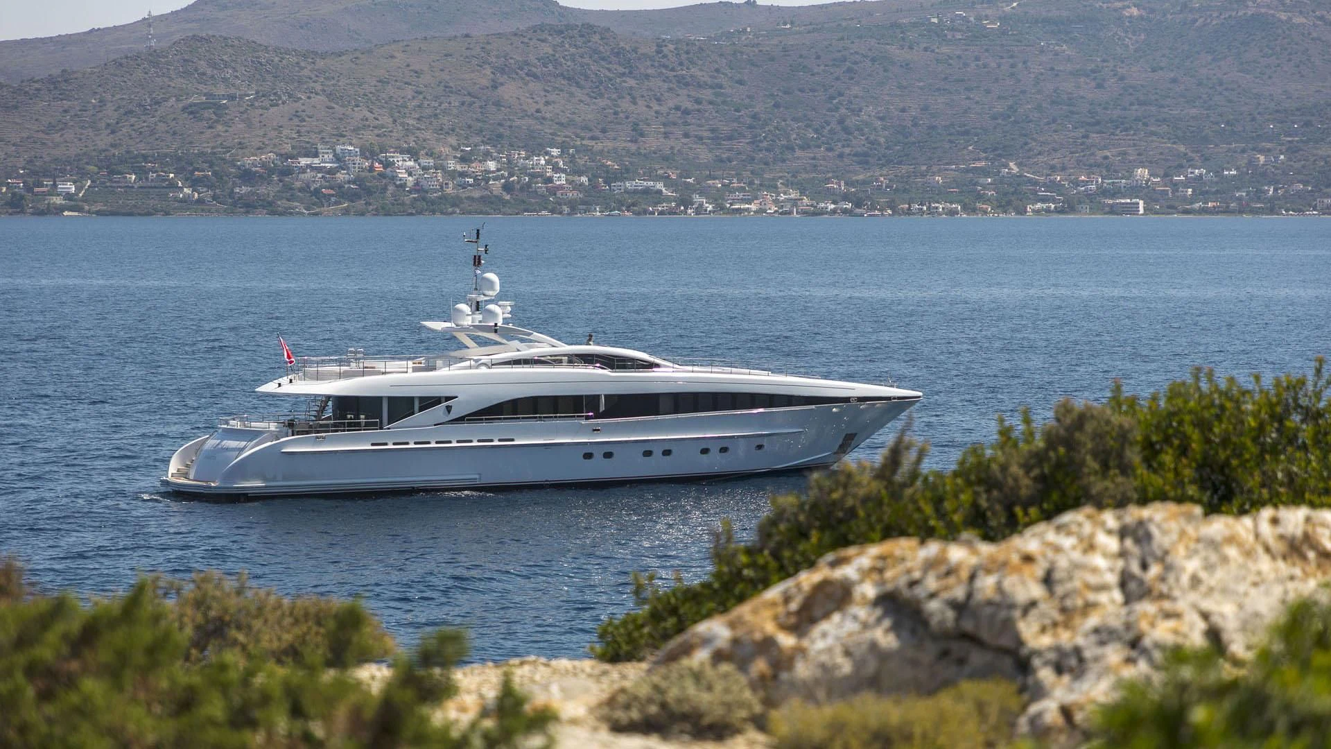 a white yacht in the water aboard L'EQUINOX Yacht for Sale