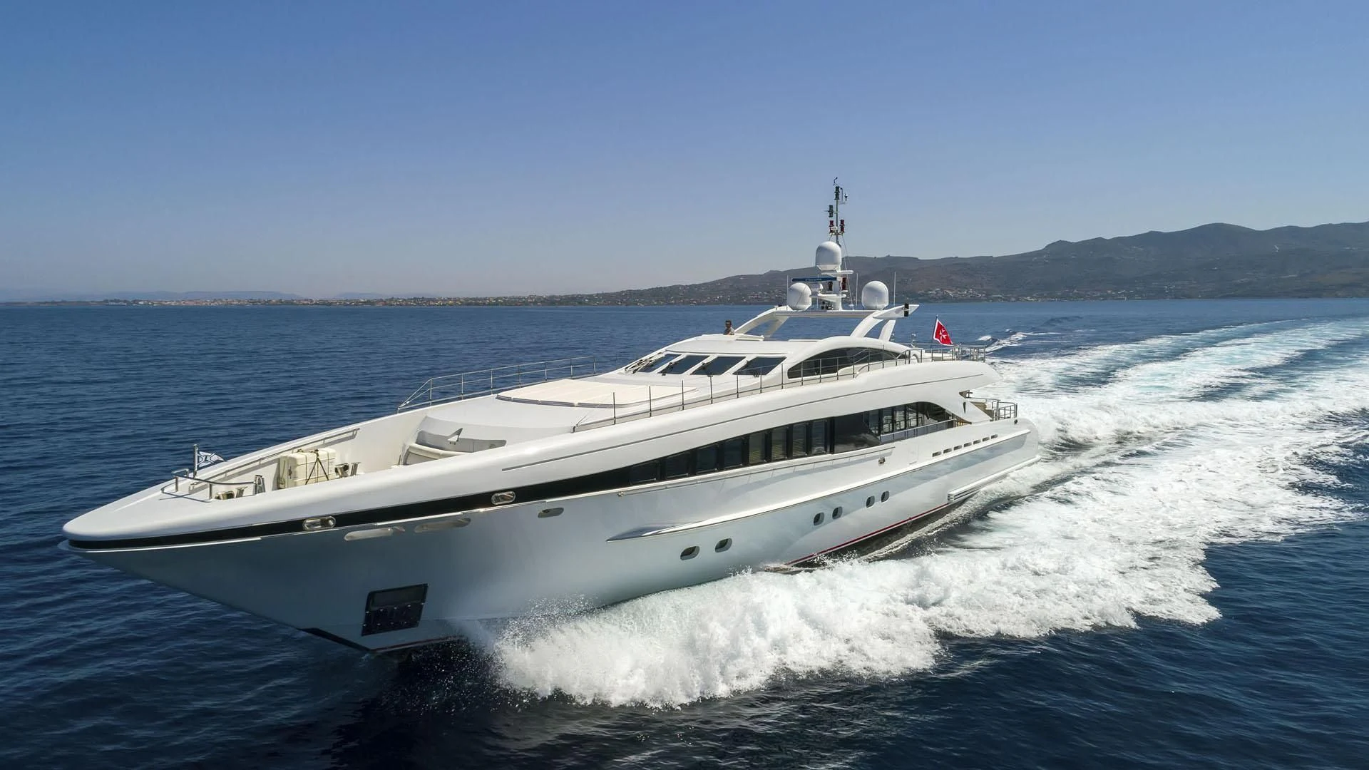 a white yacht on the water aboard L'EQUINOX Yacht for Sale