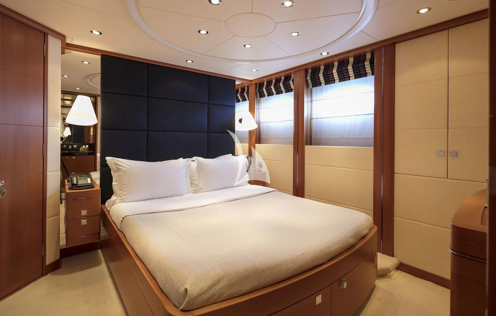 a bed in a room aboard L'EQUINOX Yacht for Sale