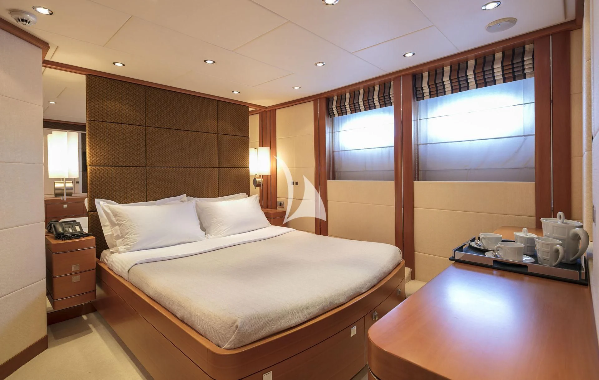 a room with a bed and a desk aboard L'EQUINOX Yacht for Sale
