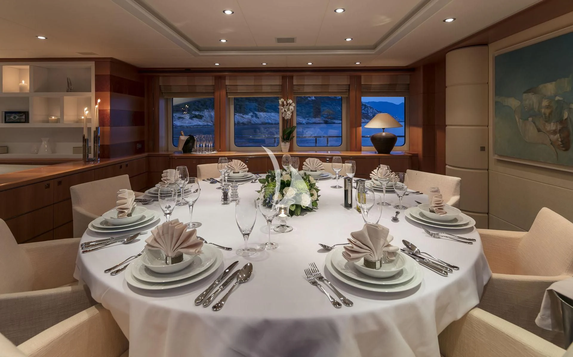 a table set for a formal dinner aboard L'EQUINOX Yacht for Sale