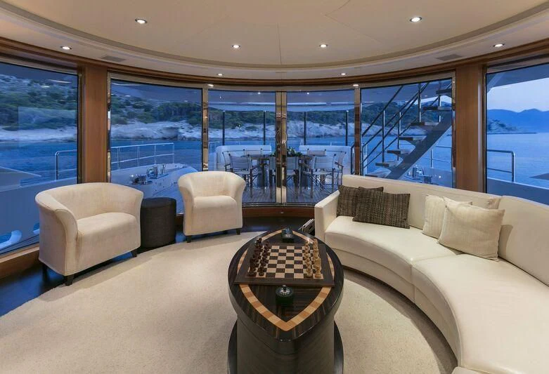 a living room with a large window aboard L'EQUINOX Yacht for Sale