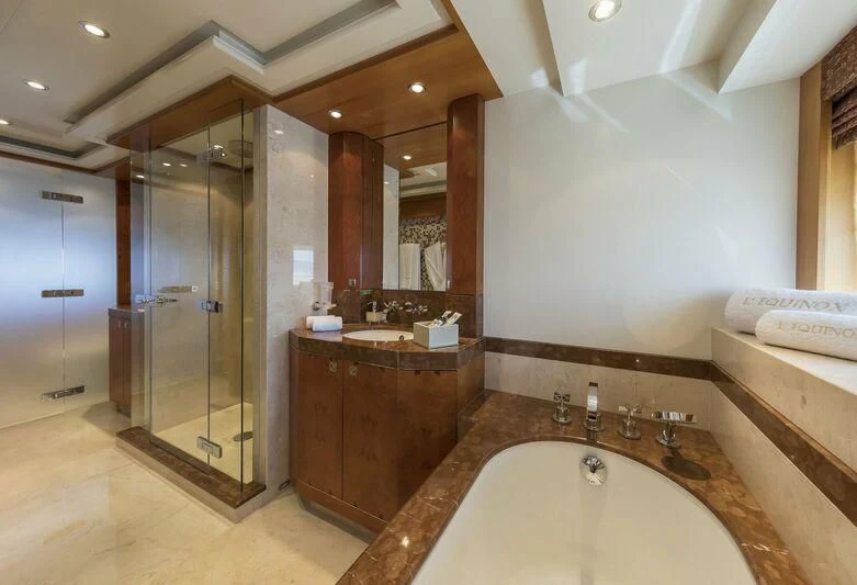 a bathroom with a large bathtub aboard L'EQUINOX Yacht for Sale