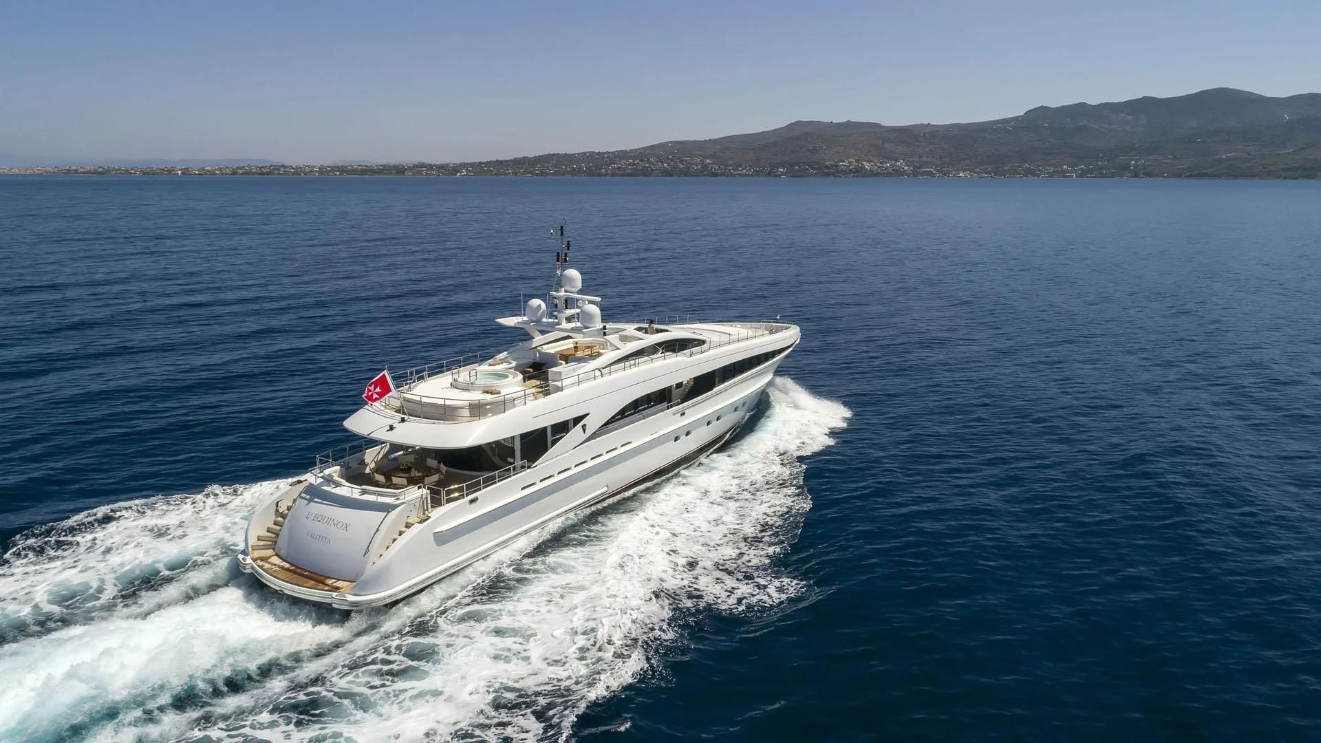 a boat on the water aboard L'EQUINOX Yacht for Sale