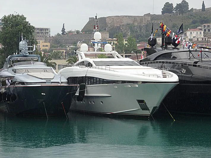 several boats docked at a pier aboard L'EQUINOX Yacht for Sale