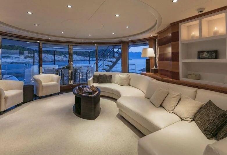 a living room with a large window aboard L'EQUINOX Yacht for Sale