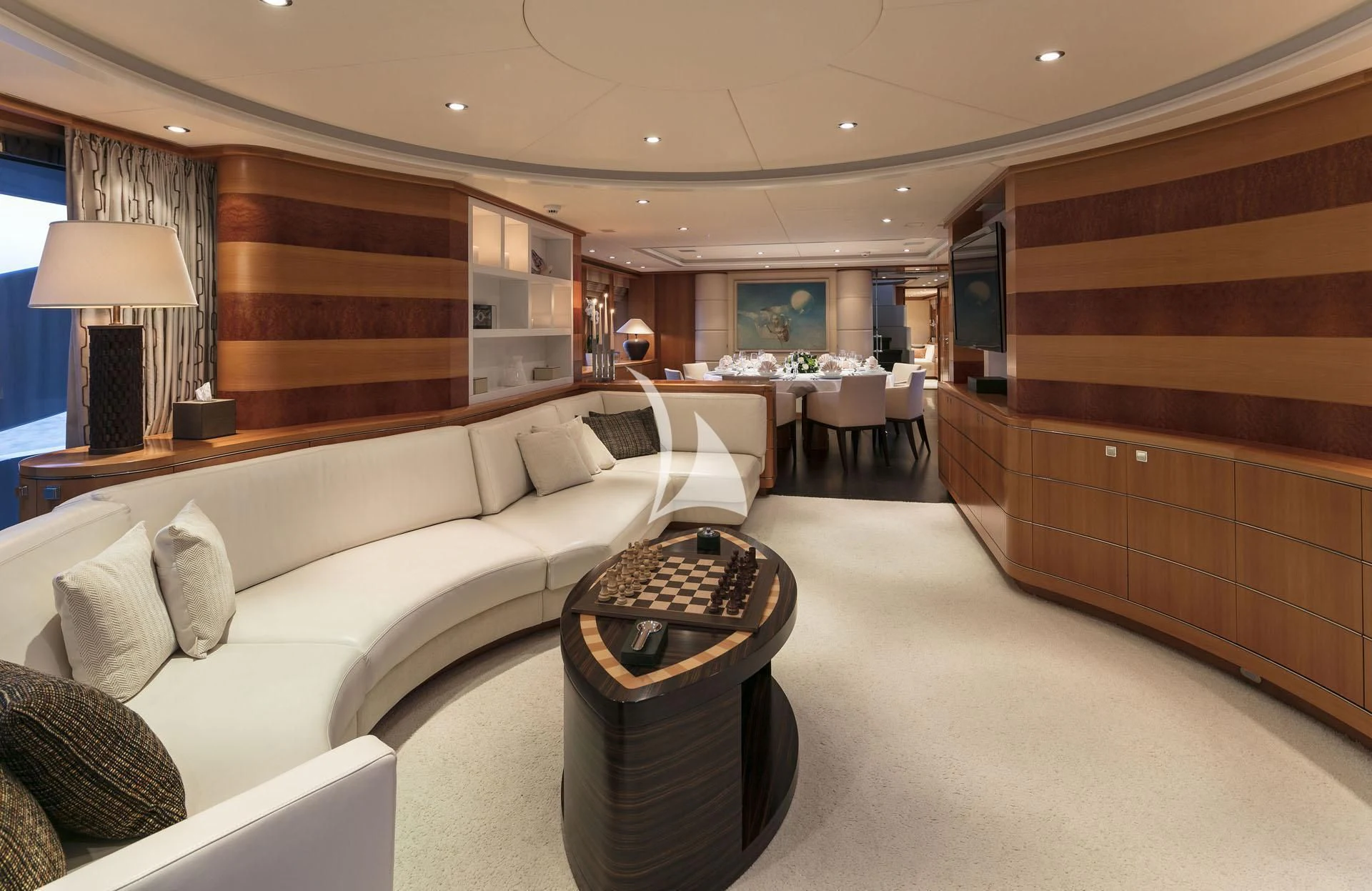 a living room with a couch and a coffee table aboard L'EQUINOX Yacht for Sale