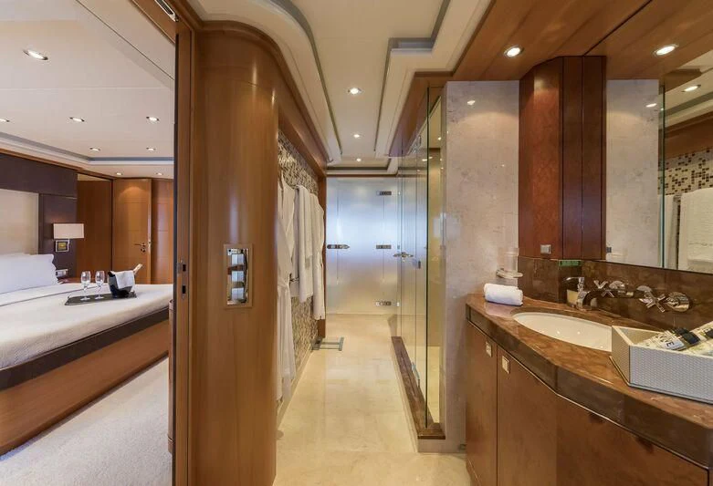 a bathroom with sinks and mirrors aboard L'EQUINOX Yacht for Sale