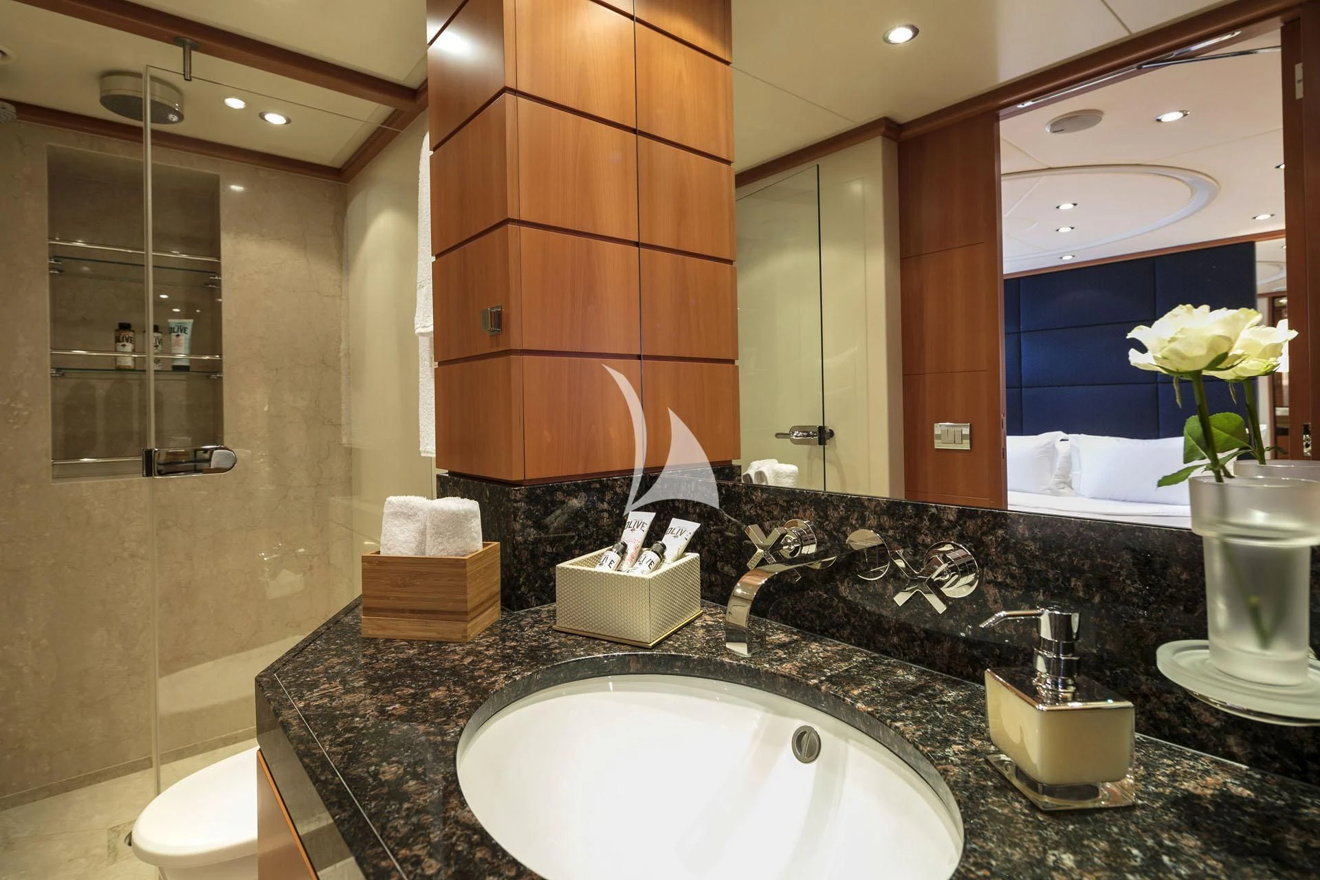 a bathroom with a large mirror aboard L'EQUINOX Yacht for Sale