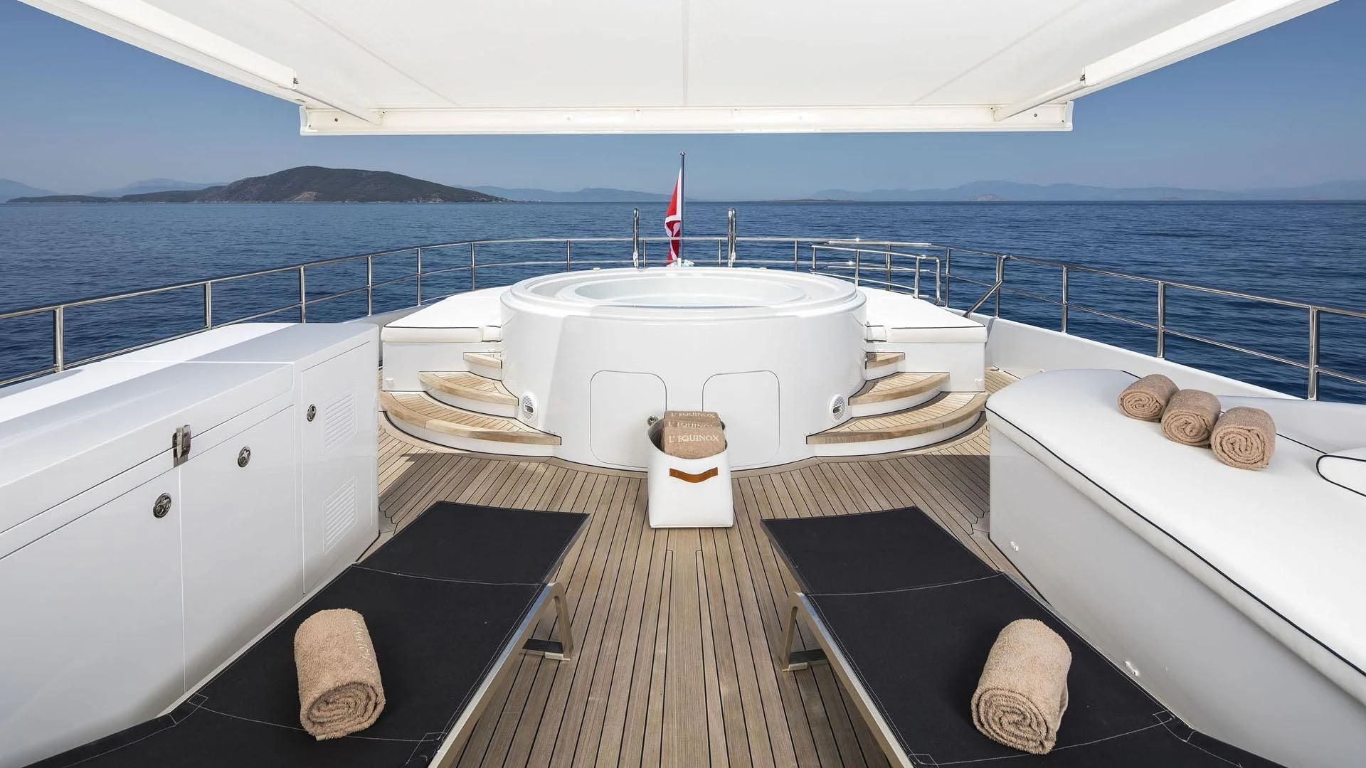 a boat on the water aboard L'EQUINOX Yacht for Sale