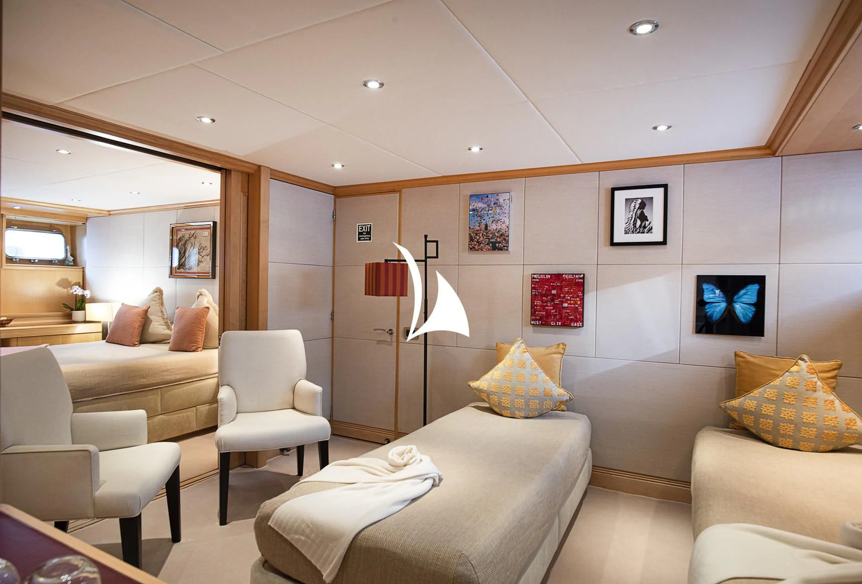 a living room with a couch and a lamp aboard DEEP BLUE II Yacht for Charter