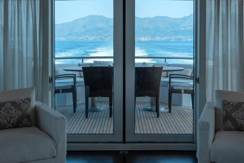 a room with a large window aboard DEEP BLUE II Yacht for Charter