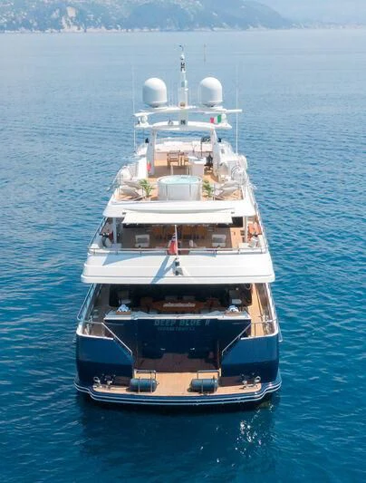 a large ship in the water aboard DEEP BLUE II Yacht for Charter
