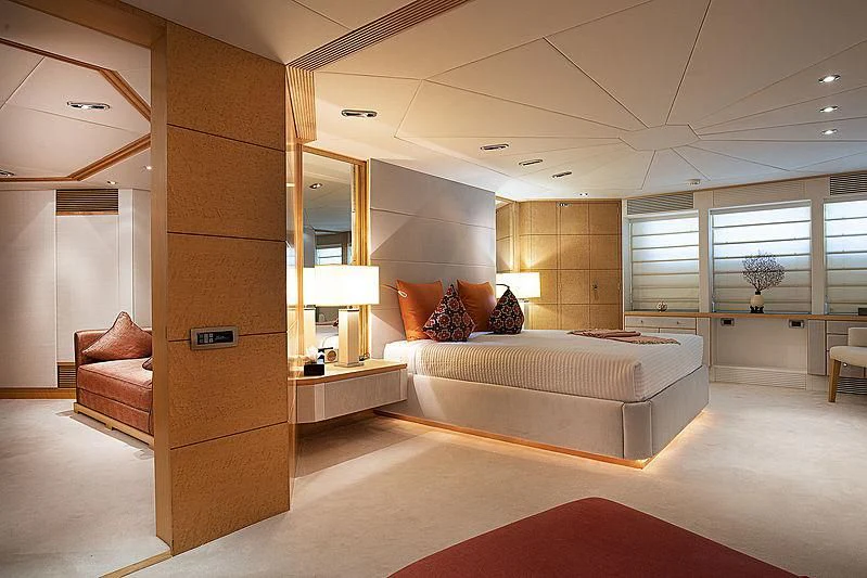 a large bedroom with a bed aboard DEEP BLUE II Yacht for Charter