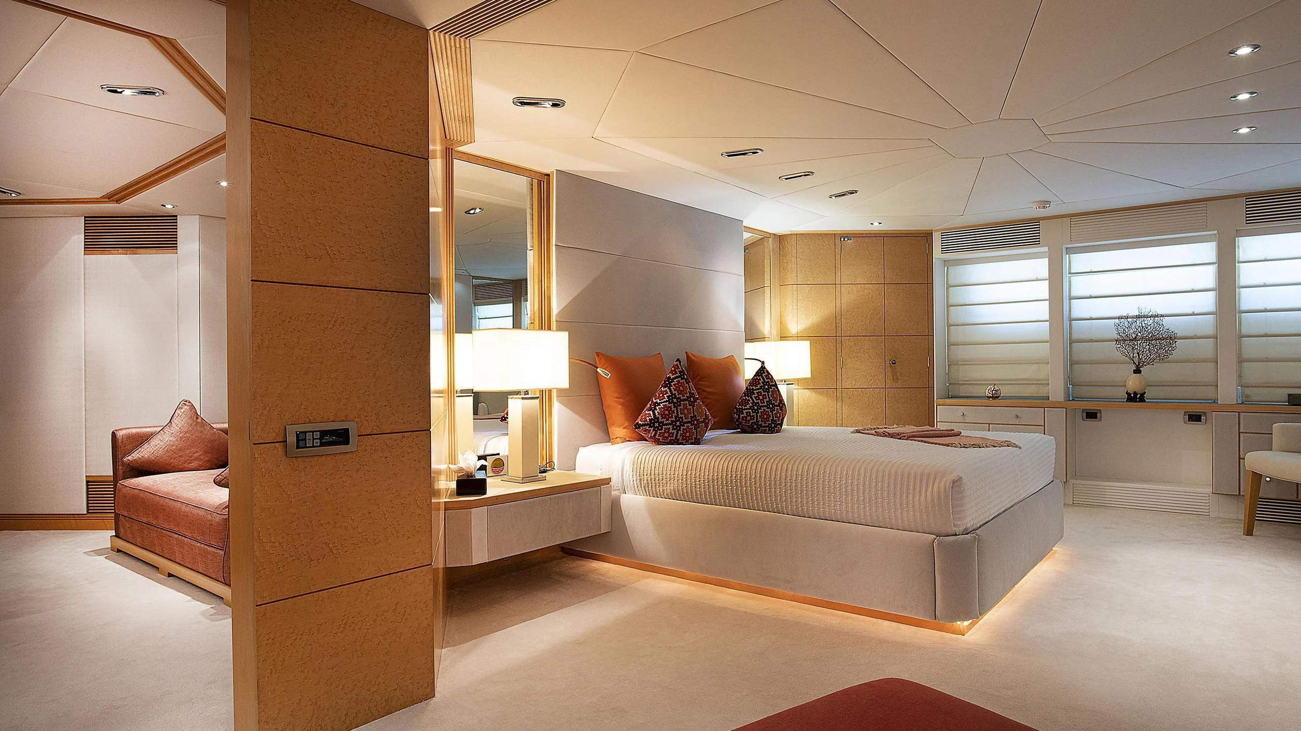 a large bedroom with a bed aboard DEEP BLUE II Yacht for Charter