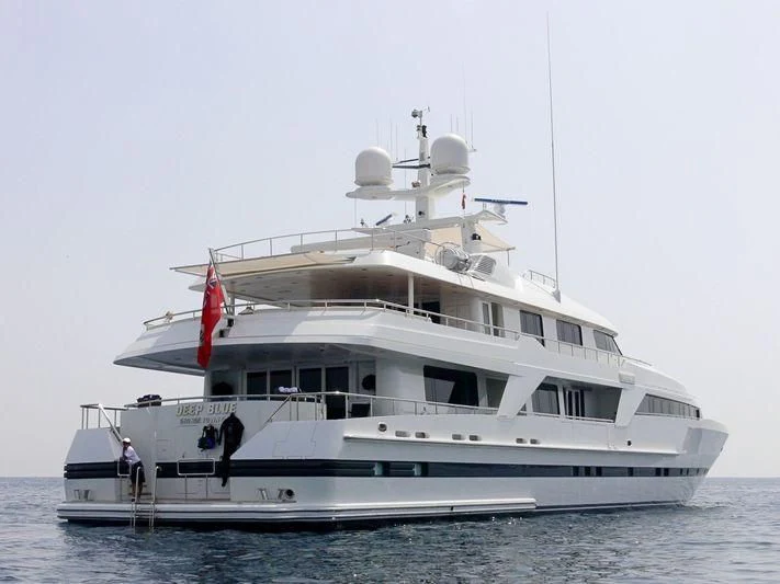 a large white boat aboard DEEP BLUE II Yacht for Charter