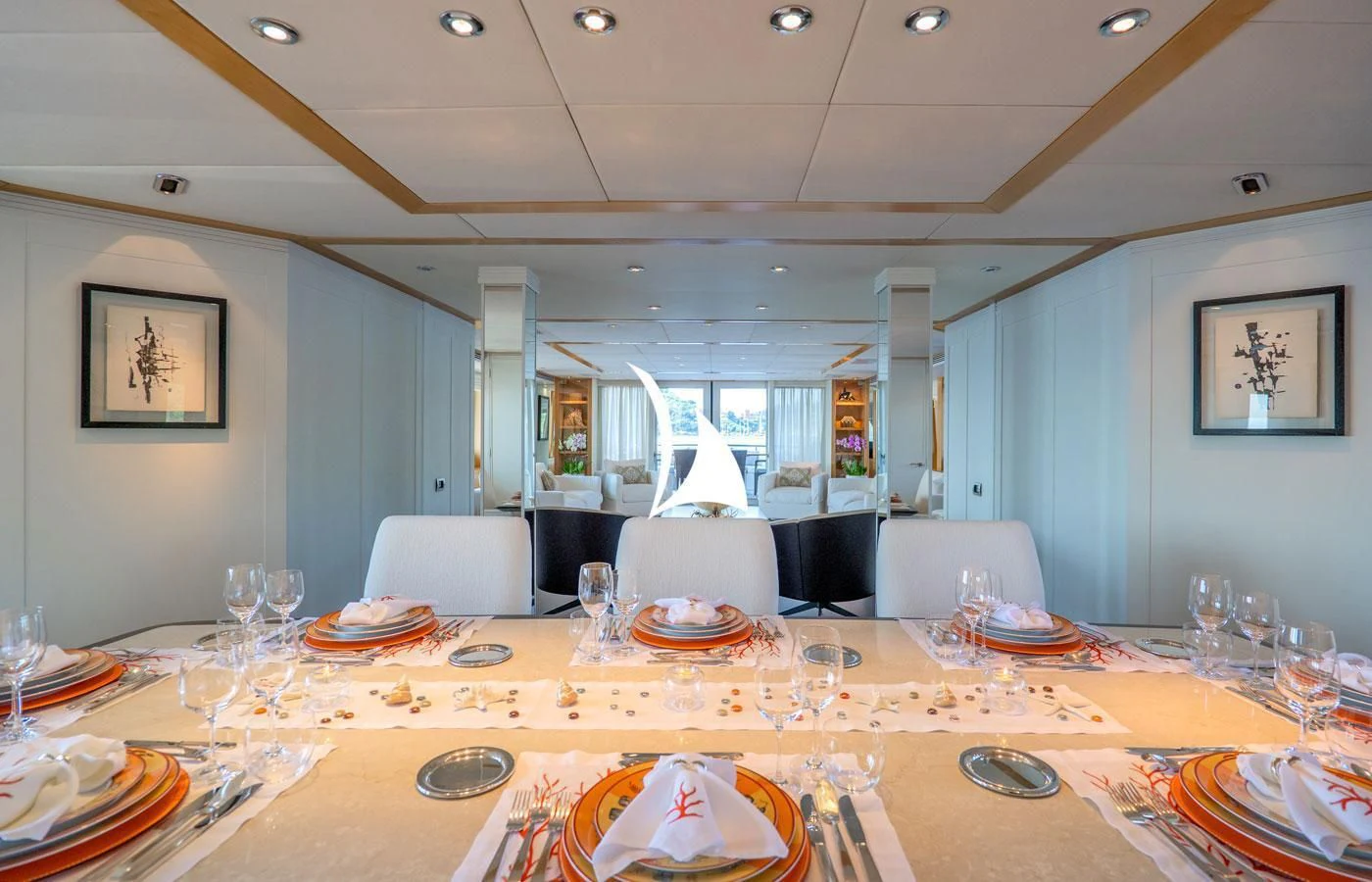 a table with plates and glasses aboard DEEP BLUE II Yacht for Charter