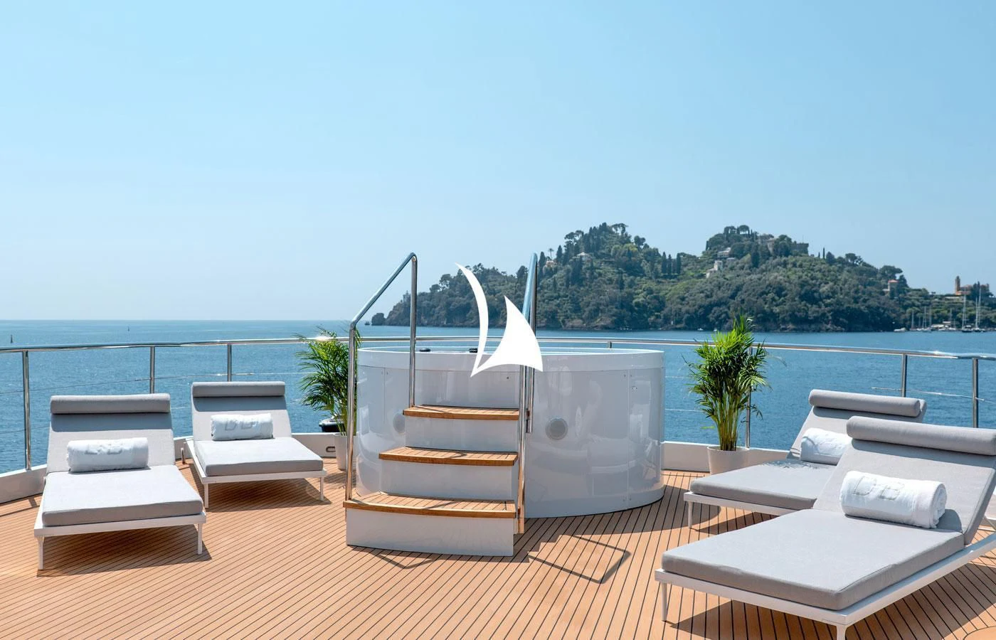 a room with a table and chairs aboard DEEP BLUE II Yacht for Charter