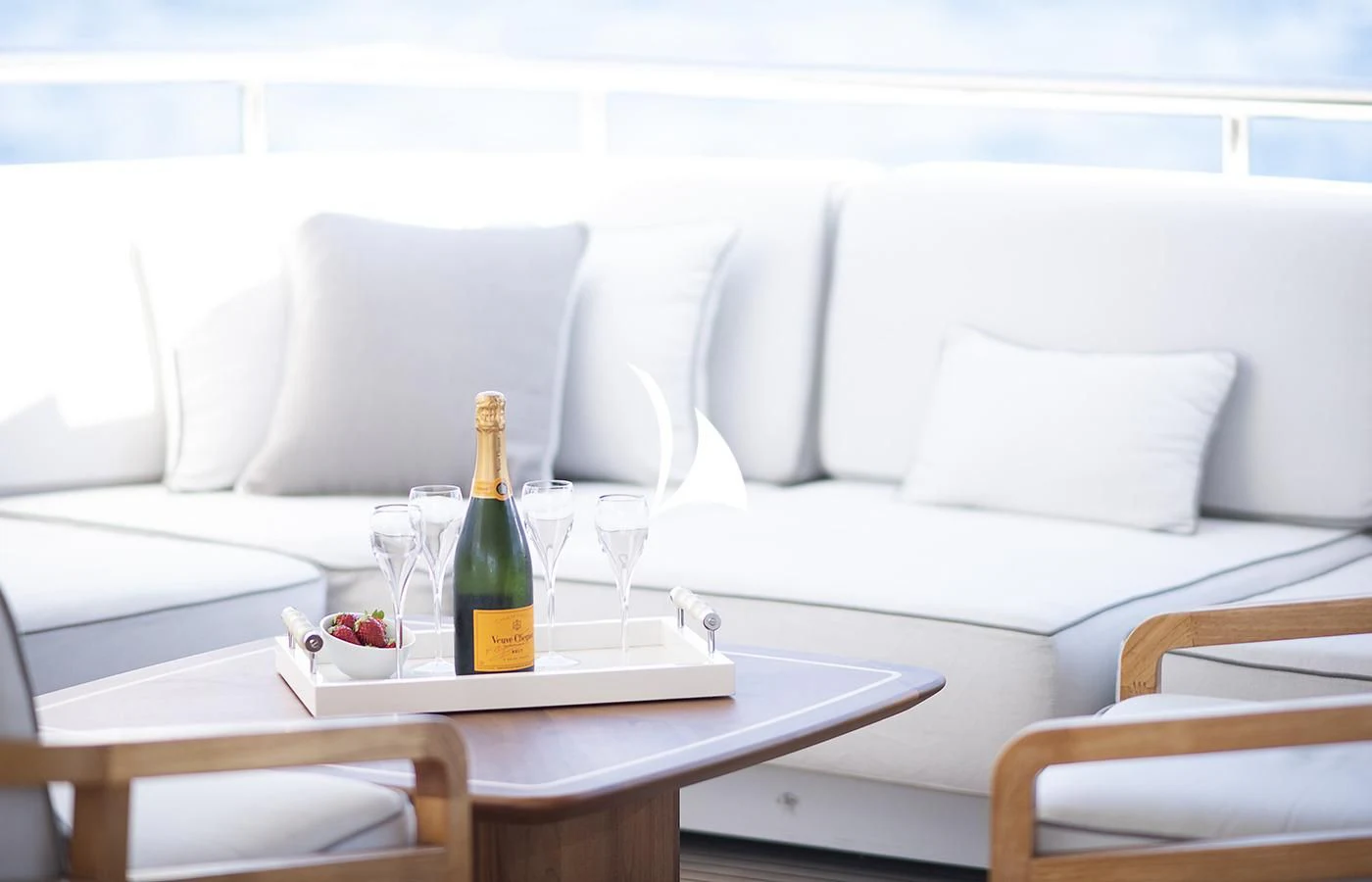 a bottle of wine on a table aboard DEEP BLUE II Yacht for Charter