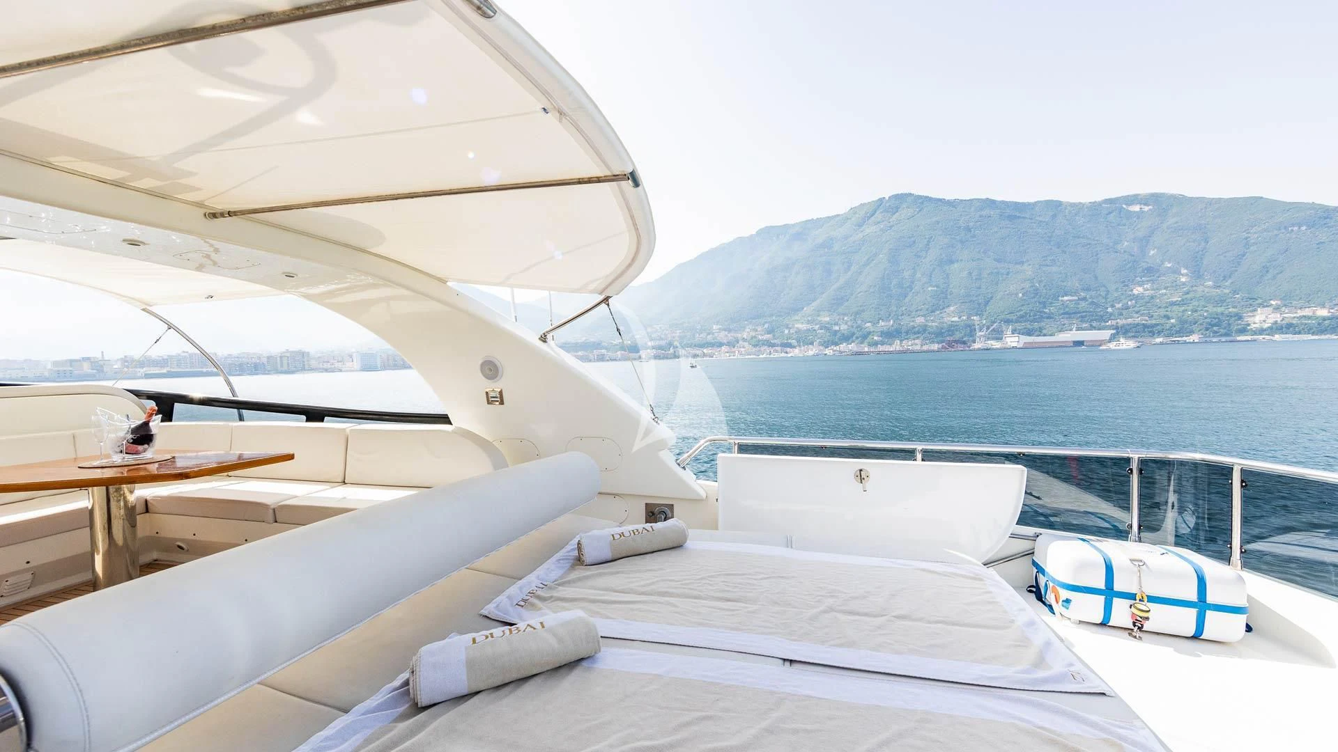 a view of the water and mountains from a plane aboard DUBAI Yacht for Sale