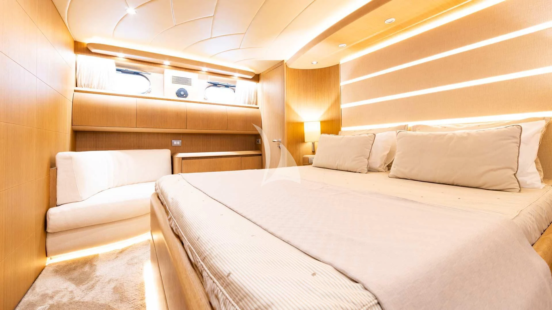a room with a bed and a window aboard DUBAI Yacht for Sale