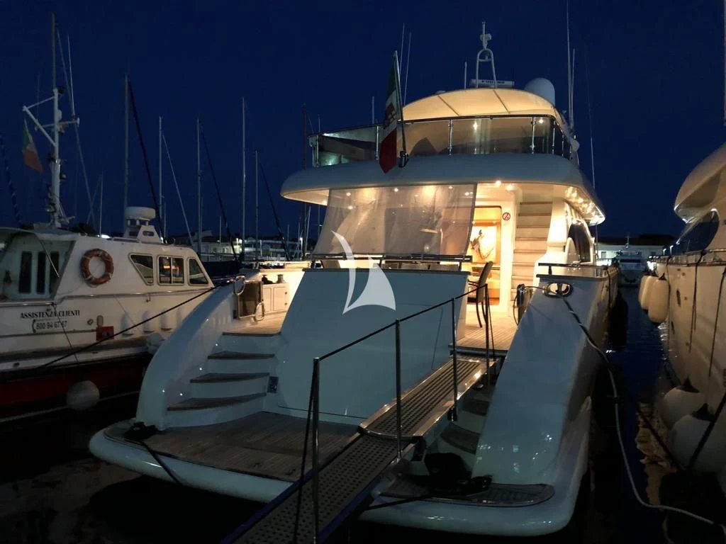 a large boat docked at a pier aboard DUBAI Yacht for Sale