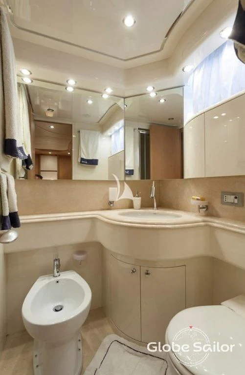 a bathroom with a sink and a mirror aboard DUBAI Yacht for Sale