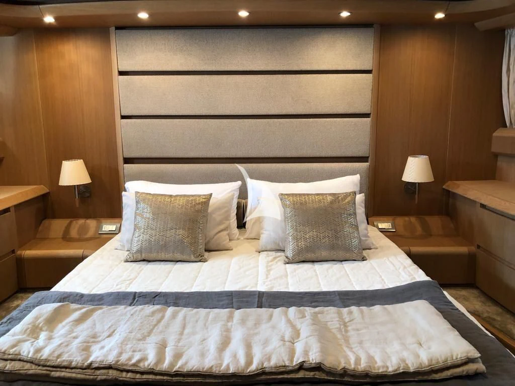a bed with pillows aboard DUBAI Yacht for Sale