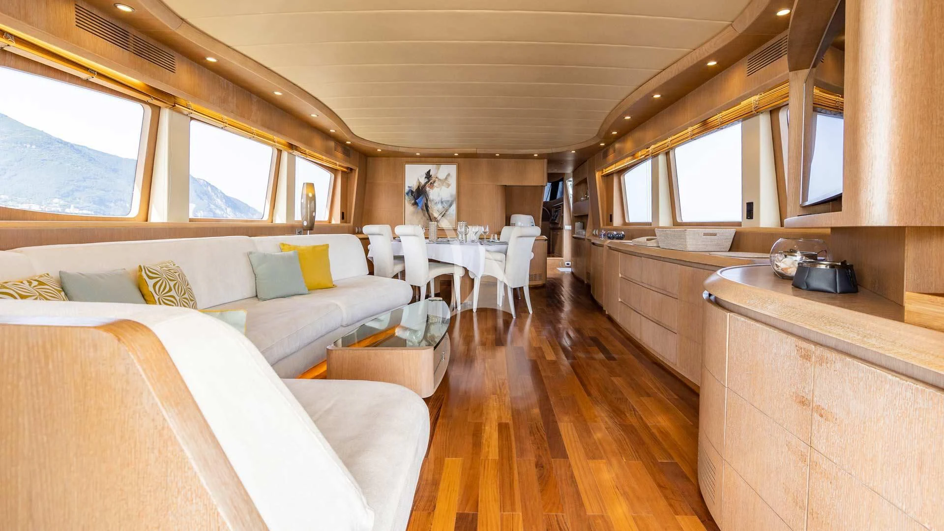a large room with a bed and a couch aboard DUBAI Yacht for Sale