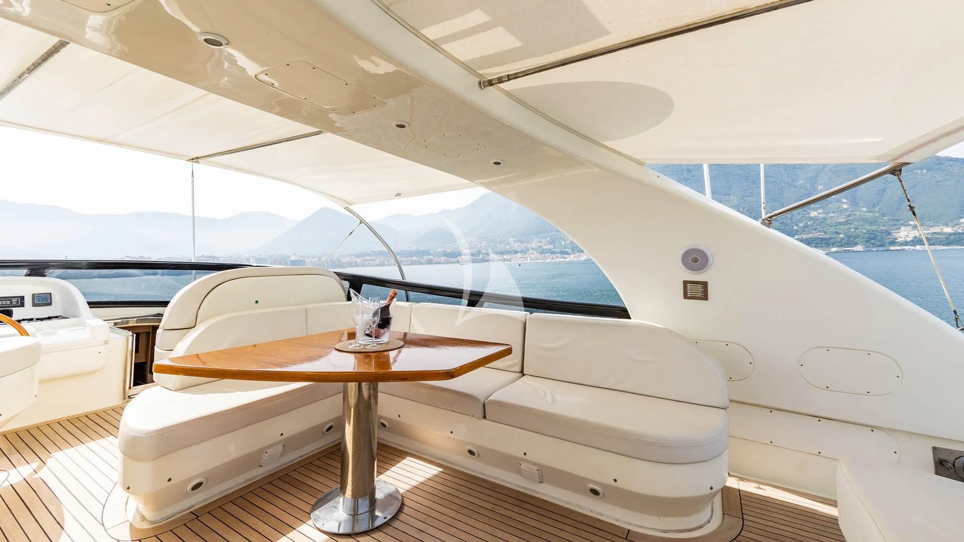 a table and a surfboard on a boat aboard DUBAI Yacht for Sale