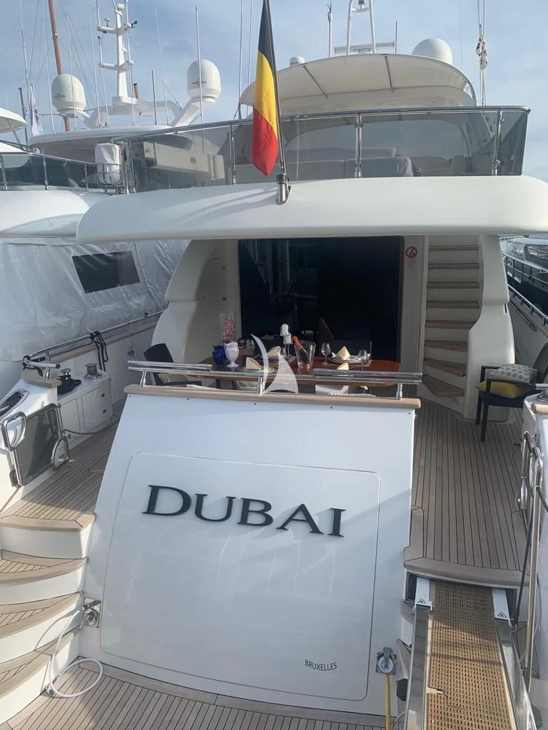 a boat with a sign on the front aboard DUBAI Yacht for Sale