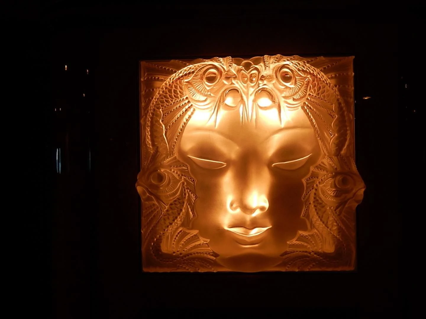 a carved wooden head aboard ATLANTIDE Yacht for Sale