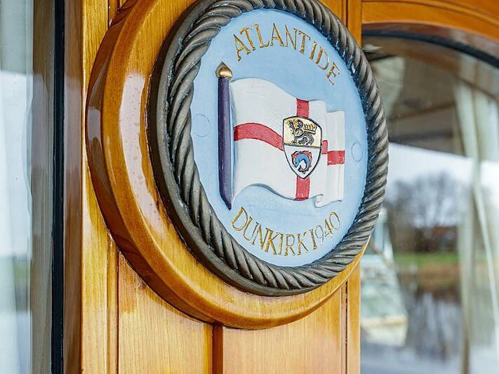 a close-up of a beer label aboard ATLANTIDE Yacht for Sale