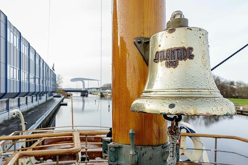 a white and yellow boat aboard ATLANTIDE Yacht for Sale
