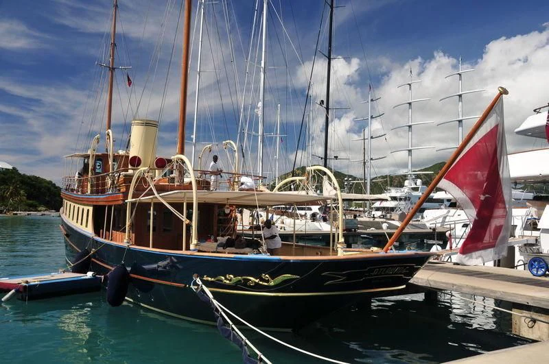 a boat with a flag on it aboard ATLANTIDE Yacht for Sale