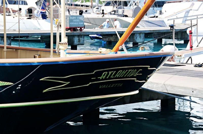 a boat docked at a pier aboard ATLANTIDE Yacht for Sale