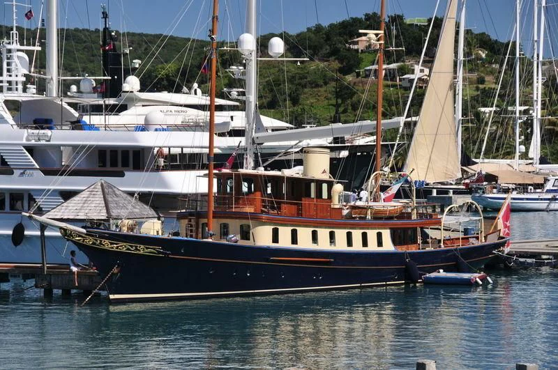 a boat docked at a pier aboard ATLANTIDE Yacht for Sale