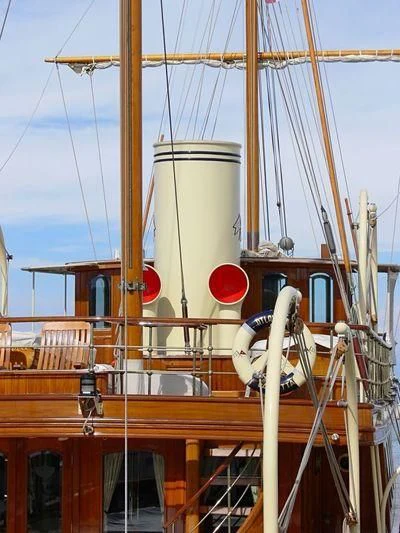 a boat with a large sail aboard ATLANTIDE Yacht for Sale