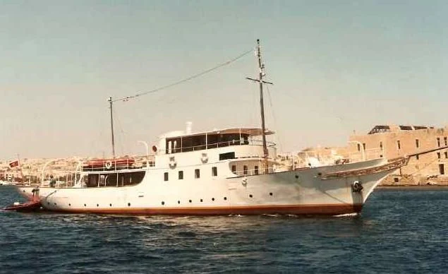 a large white boat in the water aboard ATLANTIDE Yacht for Sale