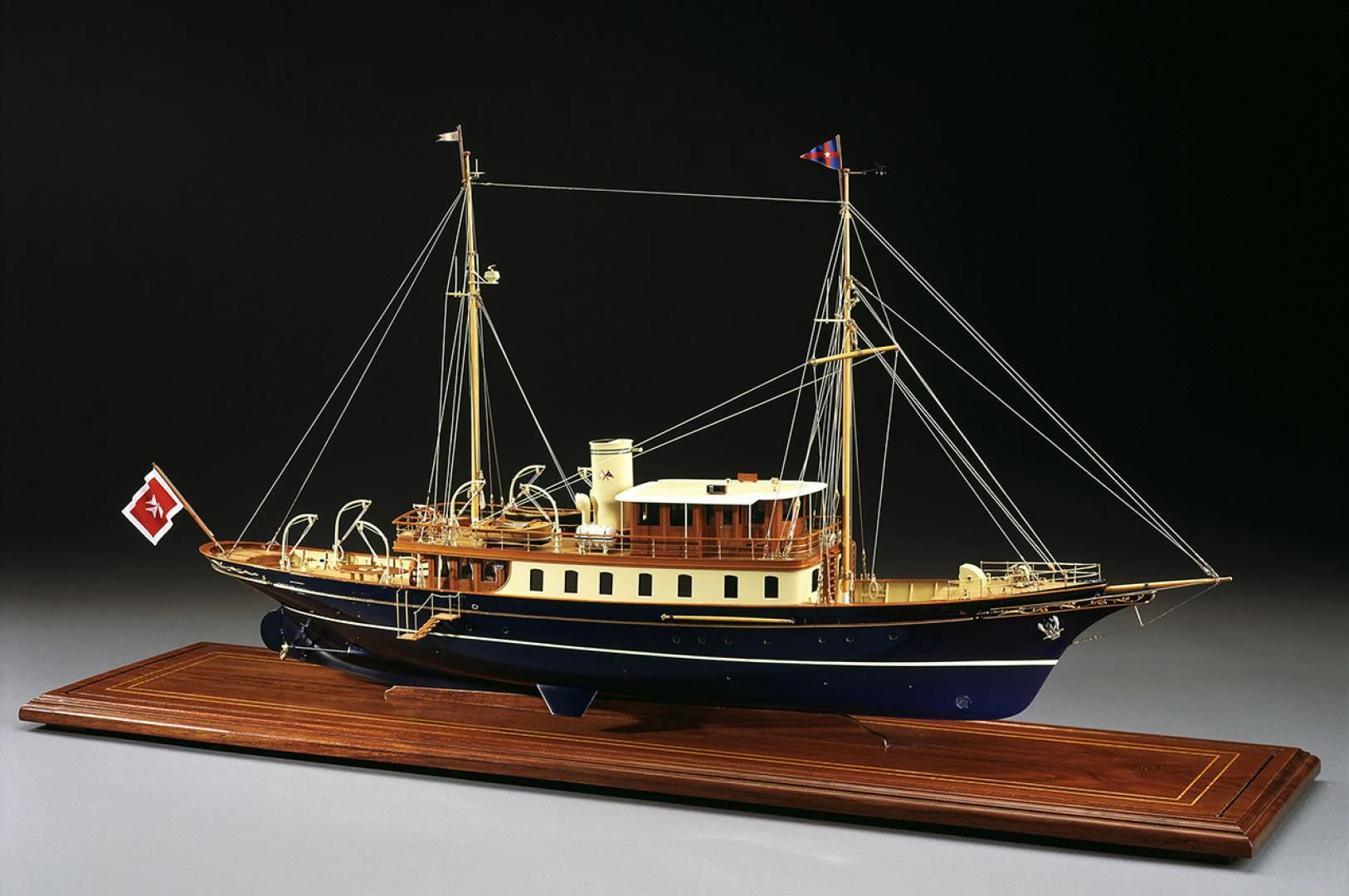 a boat with a flag on it aboard ATLANTIDE Yacht for Sale