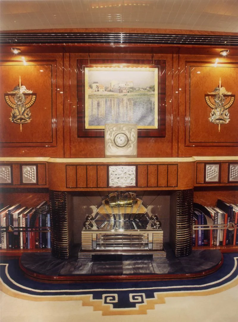 a large wooden shelf with a painting on it aboard ATLANTIDE Yacht for Sale