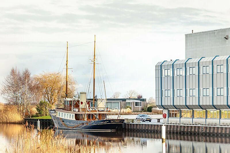 a boat docked at a pier aboard ATLANTIDE Yacht for Sale